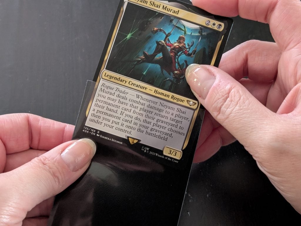 Putting a Magic card into a sleeve
