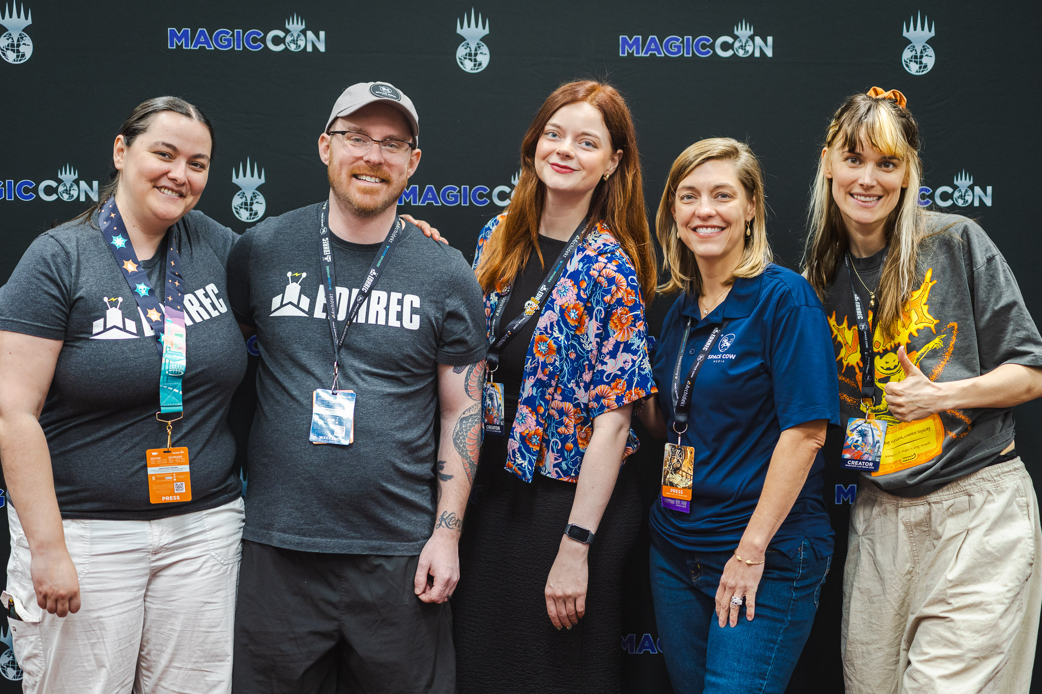 Myrna and Lize of Women In Magic+ pose with SCM staff during the Con.