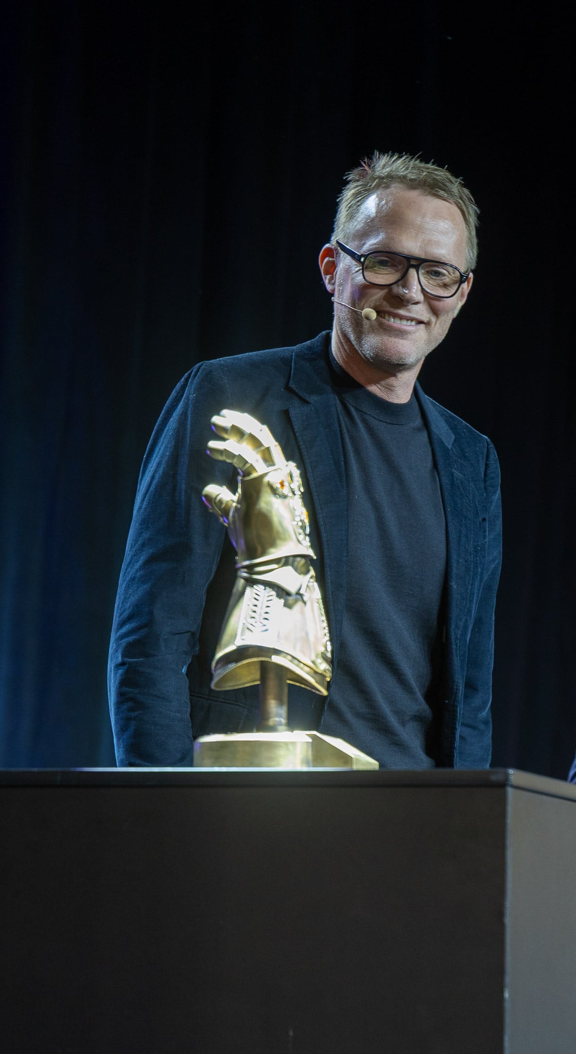 Paul Bettany warily approaches the Infinity Gauntlet.